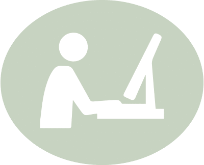 Person working at a computer icon